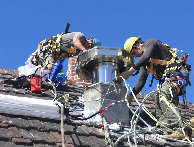 Protective chimney cap installed by Middleburg Heights Chimney Sweep in Middleburg Heights, OH